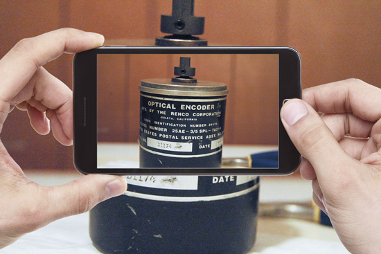 smartphone-in-hands-old-renco-encoder_550x367